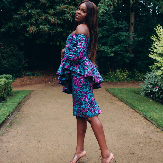 Blue, purple and black African print knee length pencil skirt in floral pattern, made from sustainably sourced Ankara wax print.