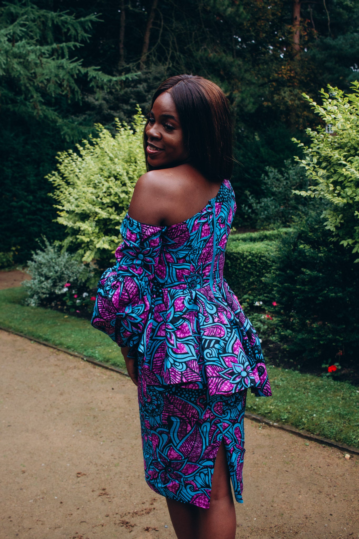 Blue, purple and black African print knee length pencil skirt in floral pattern, made from sustainably sourced Ankara wax print.