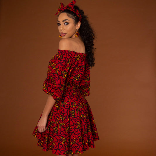 African print balloon sleeve crop top and matching high waisted flare skirt a striking red, yellow and black ankara fabric