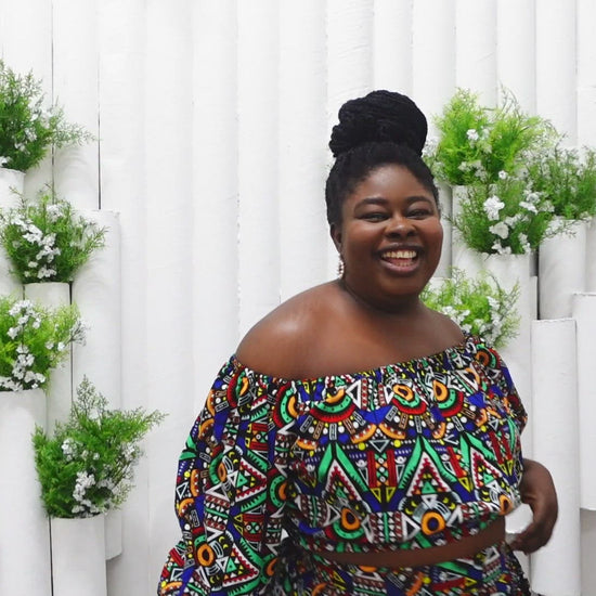 Ifemi Balloon Sleeved Crop Top with an elasticated neckline in a vibrant Ankara wax, geometric multicolored pattern using sustainable ethically sourced Cotton, designed in England Made in Nigeria.