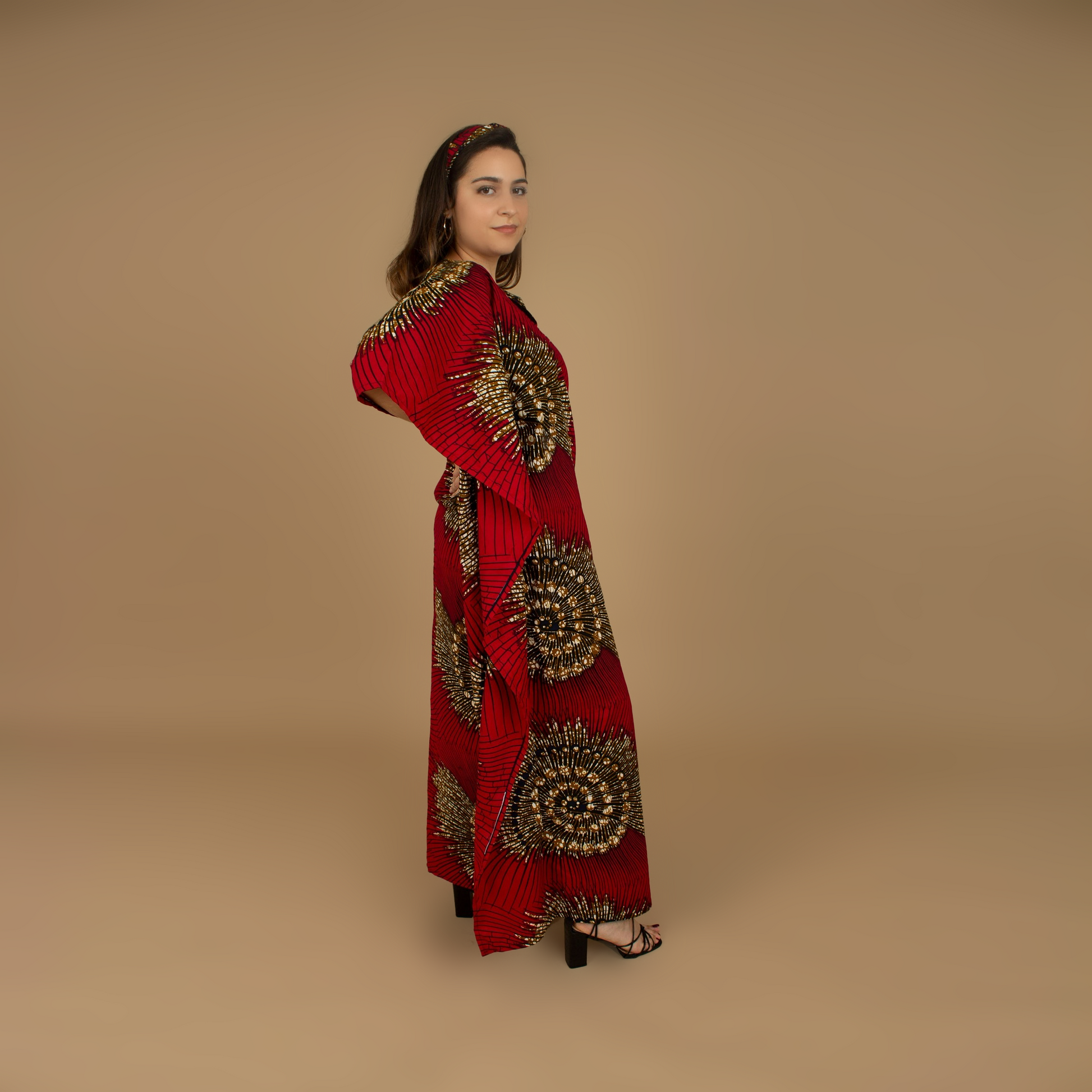 The Ata Floor Length lightweight African Print Kaftan Dress in Ankara wax print in red, white and black oversized textured swirl African Print pattern is ethically sourced cotton. Designed in England Made in Nigeria. 