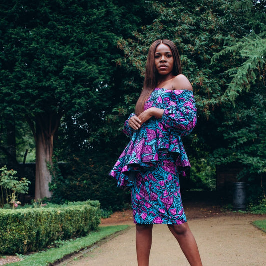 Blue, purple and black African print knee length pencil skirt in floral pattern, made from sustainably sourced Ankara wax print.