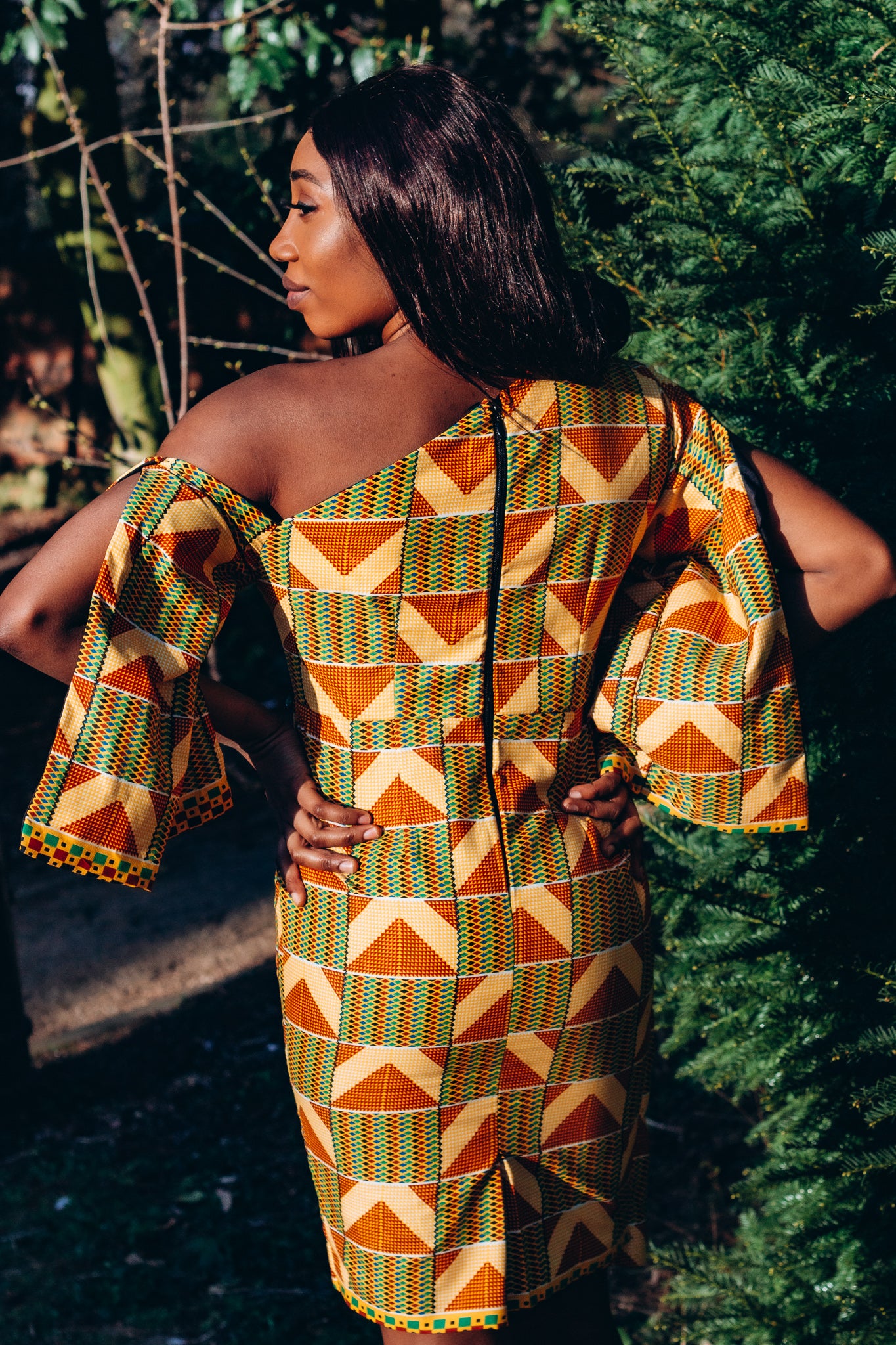  Yellow , green and orange Ama triangle African print Kente Knee high cape dress with long open sleeves, Off the shoulder and rippled button hole features