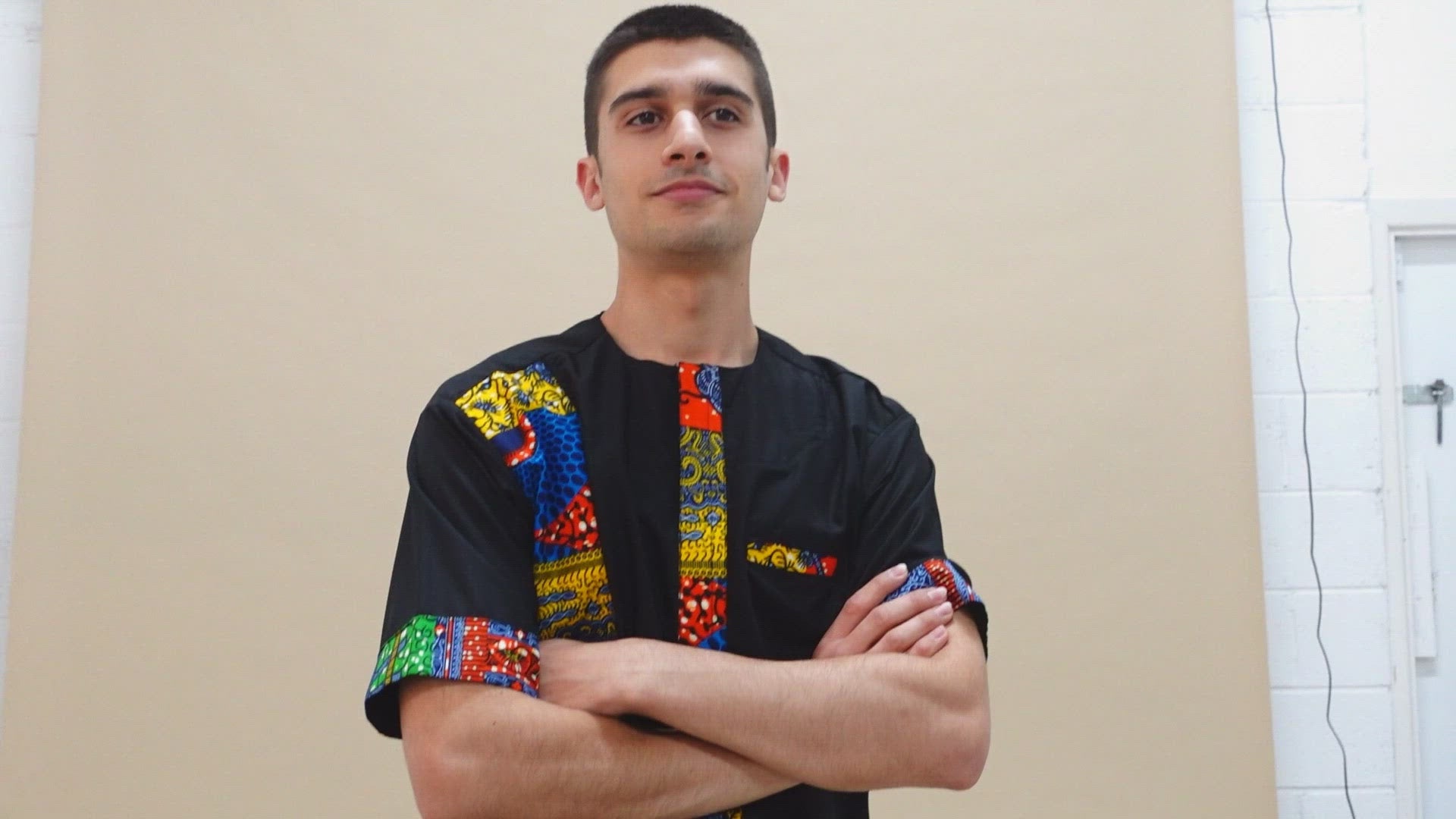 The Sade Patchwork Kaftan Top is a linen fabric trimmed with sustainable Ankara wax print in a vibrant multi-coloured mandala patchwork pattern. Designed in England Made in Nigeria, Available in standard and plus sizes (UK XS-5XL). 
