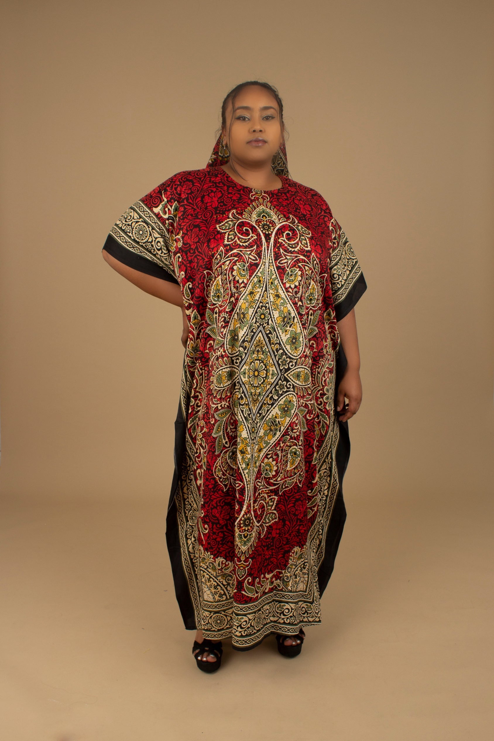 The Dashiki Floor Length Kaftan Dress in a lightweight Chiffon Fabric in a gorgeous rich red, white, black and gold floral mandala African Print pattern. Designed in England Made in Nigeria. 
