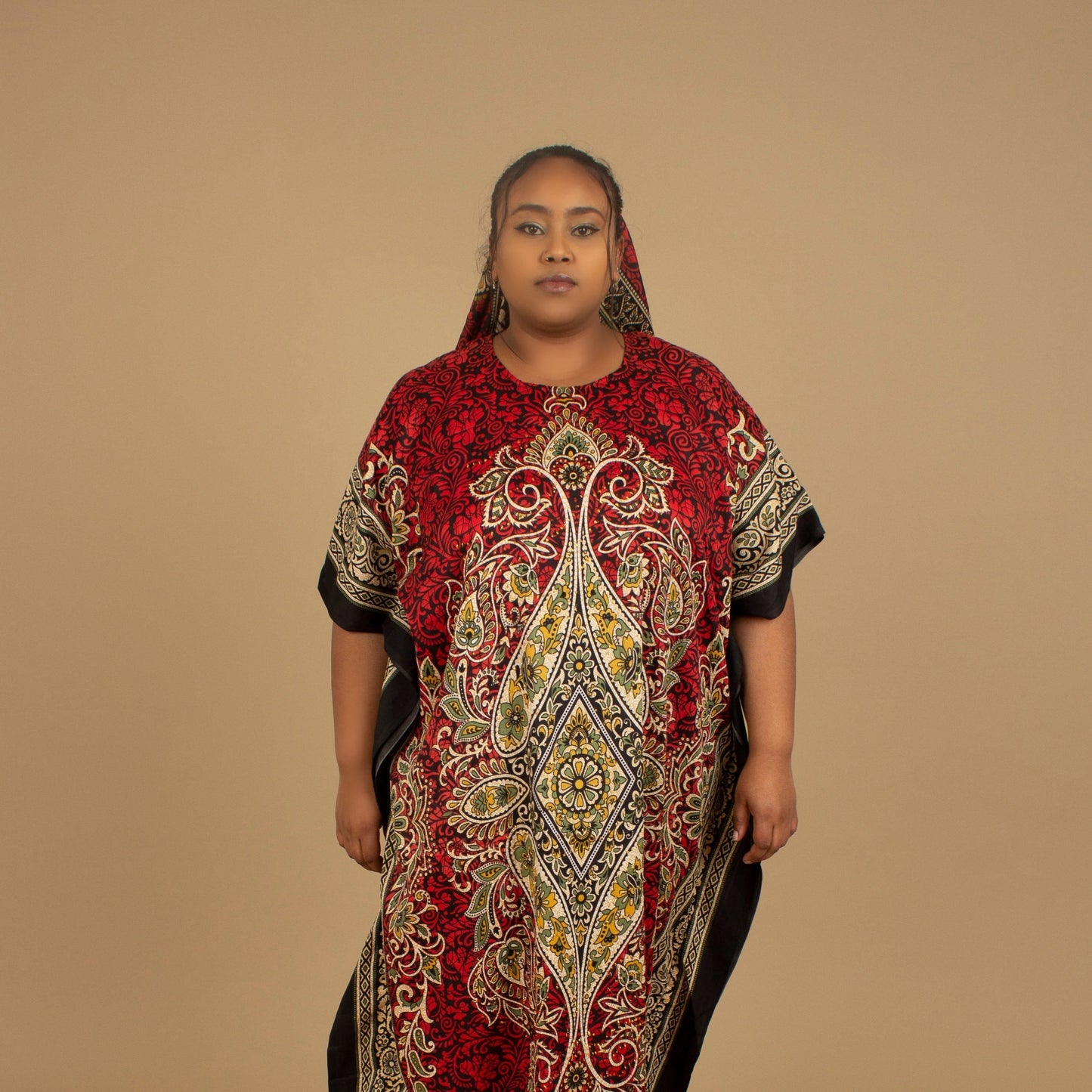The Dashiki Floor Length Kaftan Dress in a lightweight Chiffon Fabric in a gorgeous rich red, white, black and gold floral mandala African Print pattern. Designed in England Made in Nigeria. 